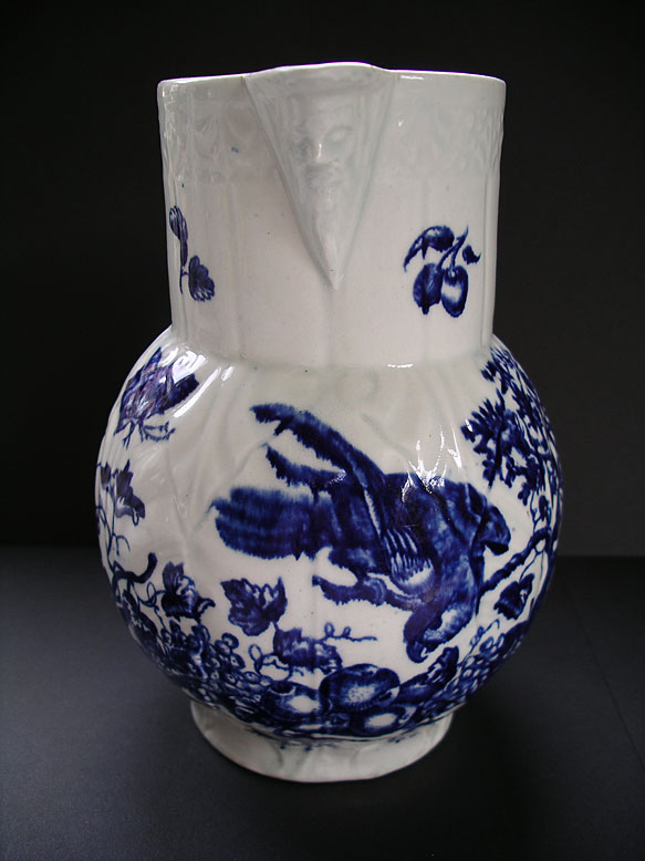 Worcester porcelain blue and white mask jug with the Parrot Pecking Fruit pattern BFS II.23 1770-1785