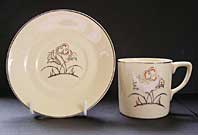 ART DECO JOHNSON BROTHERS COFFEE CANS AND SAUCERS WITH HIGHLY STYLIZED MODERNIST FLORAL DECORATION C.1935