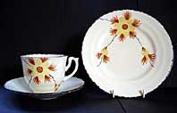 PARROTT CORONET WARE ART DECO CUP SAUCER & TEA PLATE TRIO C.1930-35 HAND PAINTED WITH THE MONKEY TREE PATTERN